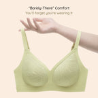 Comfort of Lace-Illusion Soft Mesh Wireless Bra (Milky Green), held by a hand against a beige background.
