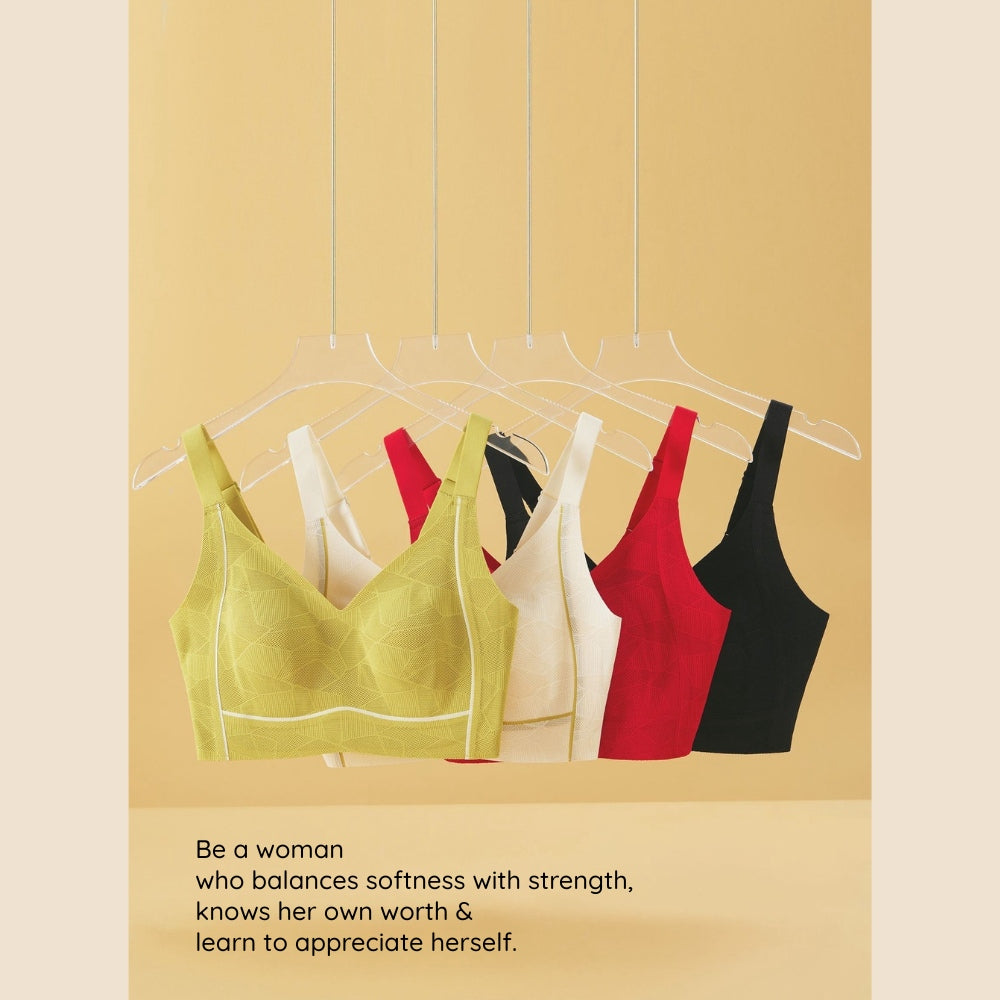 Different colors of Dreamy Terraced Fields Lace Wireless Bra on a rack with motivational quote
