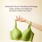 Green Air-Fit Wavy Moulded Wireless Bra held by a hand with text about advanced vacuum moulding technology 