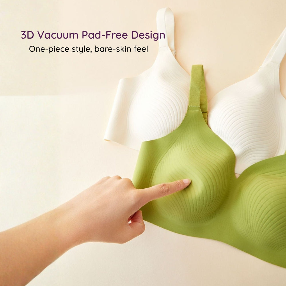 3D vacuum pad free, Green Air-Fit Wavy Moulded Wireless Bra with a hand touching it, on a beige background